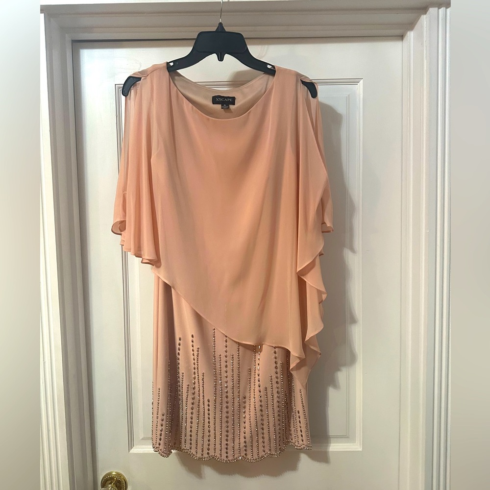 Beaded size 6 cocktail dress. Perfect for a wedding.